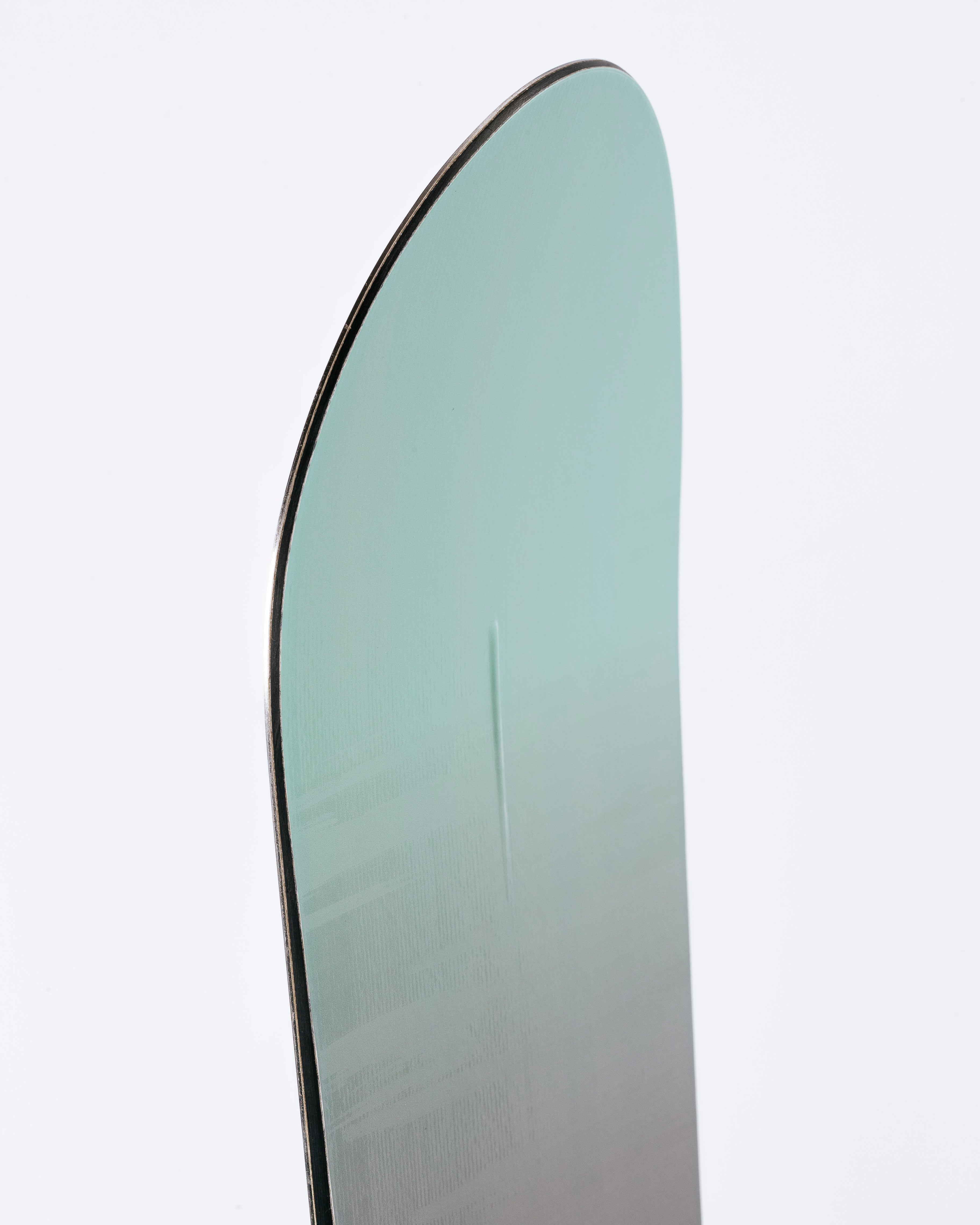 The nose of freeride womens snowboard with HotRod technology visible. Muse 2025 | Rome Snowboards™