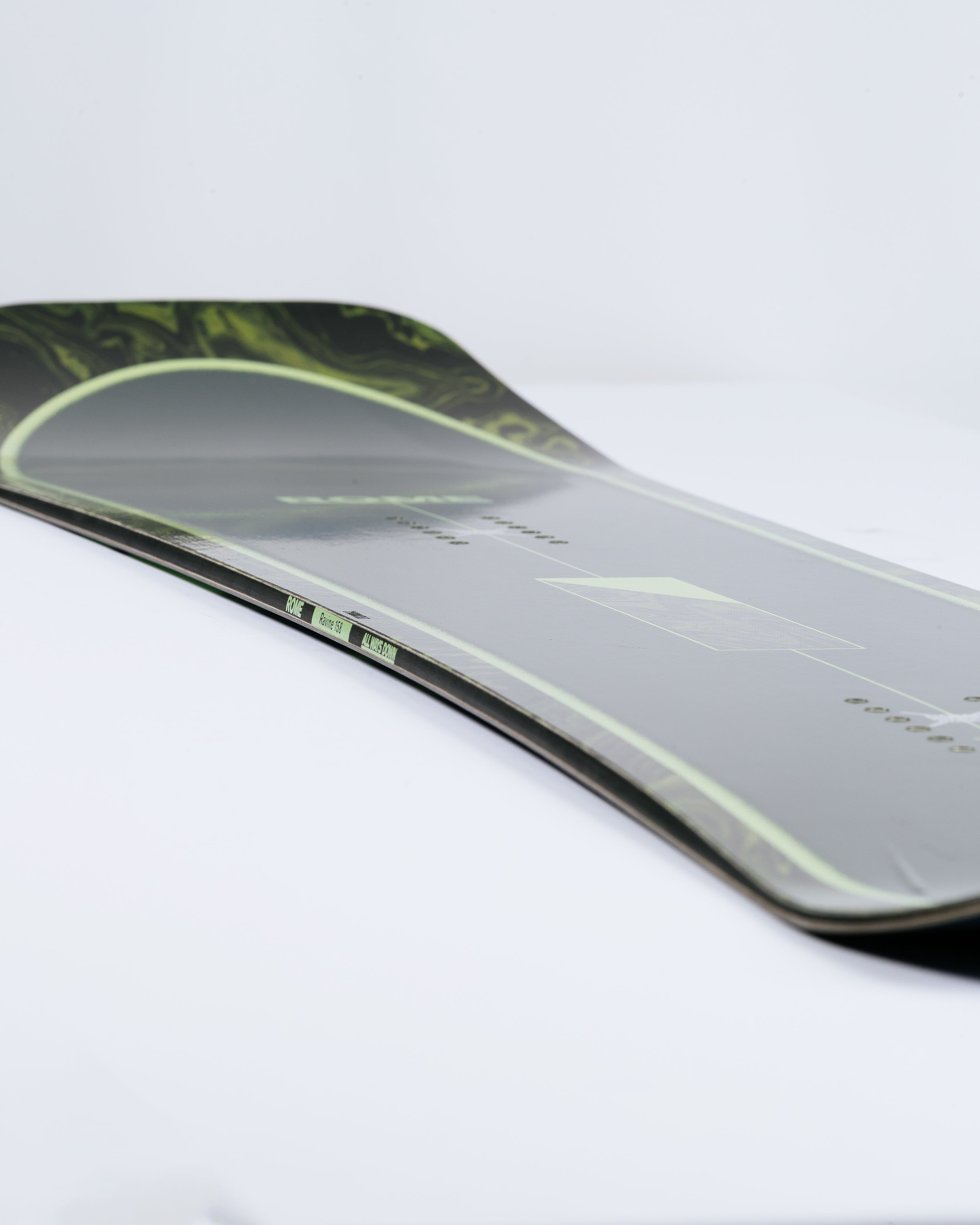 Photograph showing powder snowboard with free-the-ride camber. Rome Ravine 2025 | Rome Snowboards™