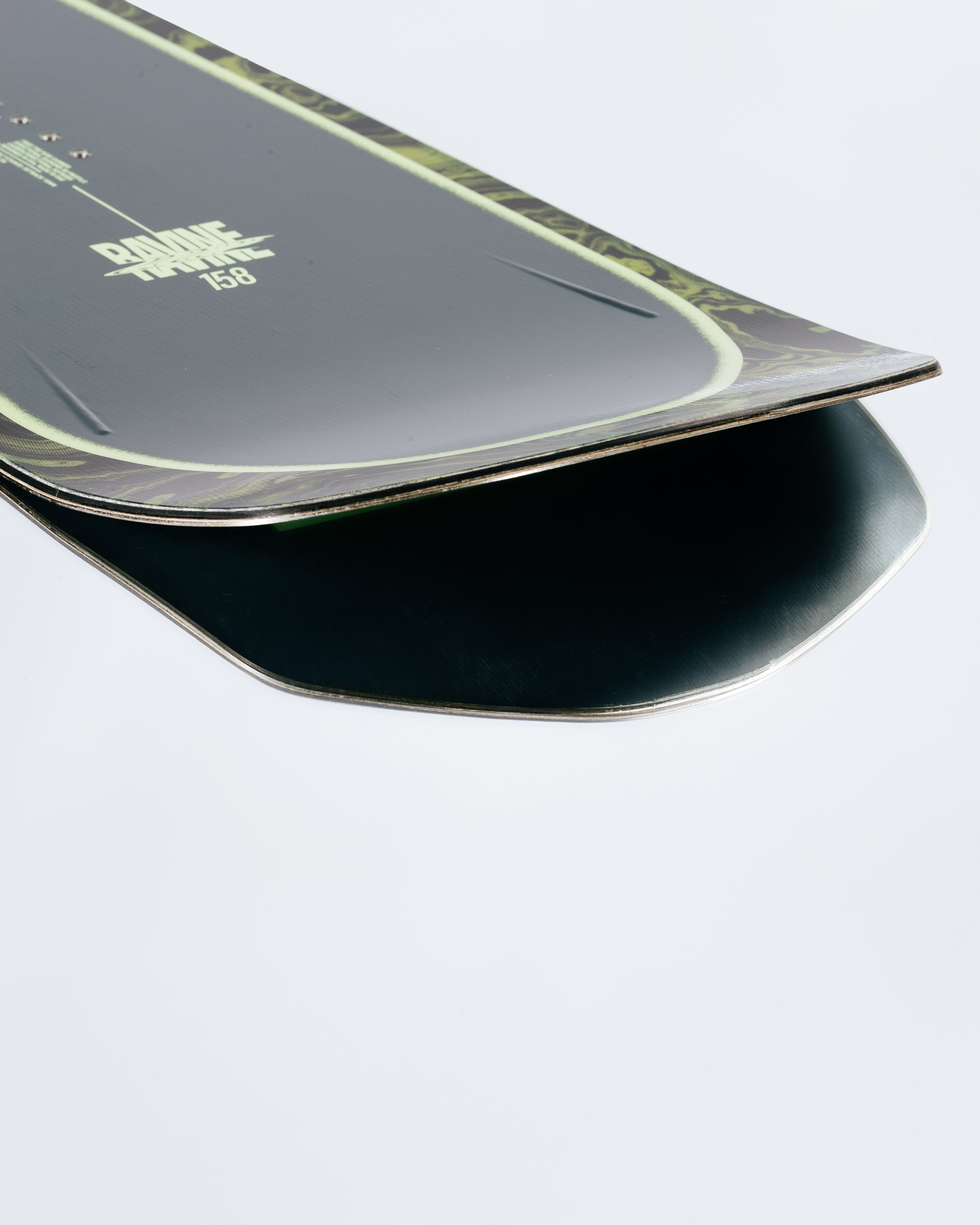 The tail and base of the powder snowboard with HotRods and SinterStrong base. Rome Ravine 2025 | Rome Snowboards™