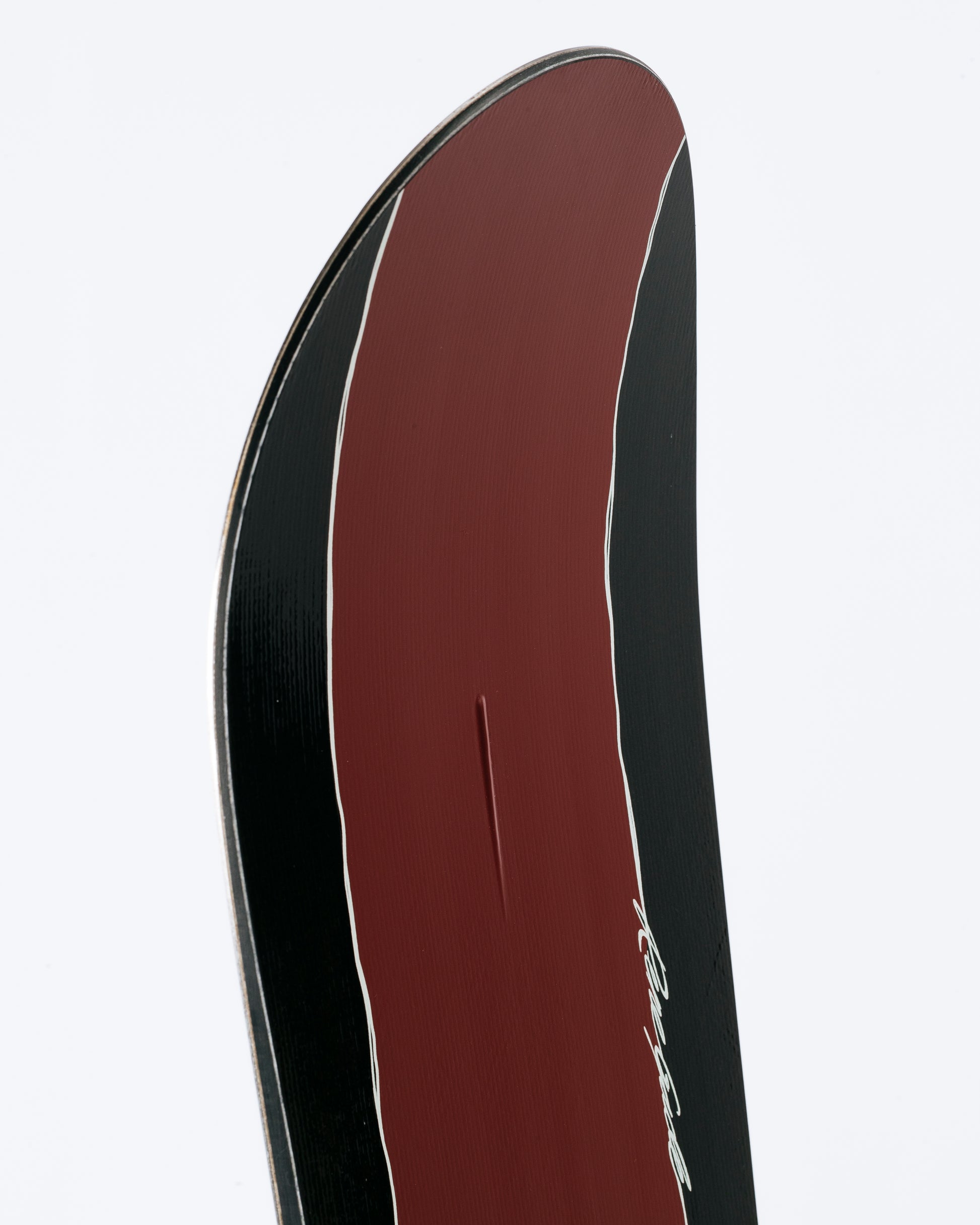 The nose of freestyle snowboard with HotRod technology visible. Rene-gade 2025 | Rome Snowboards™ 2025.