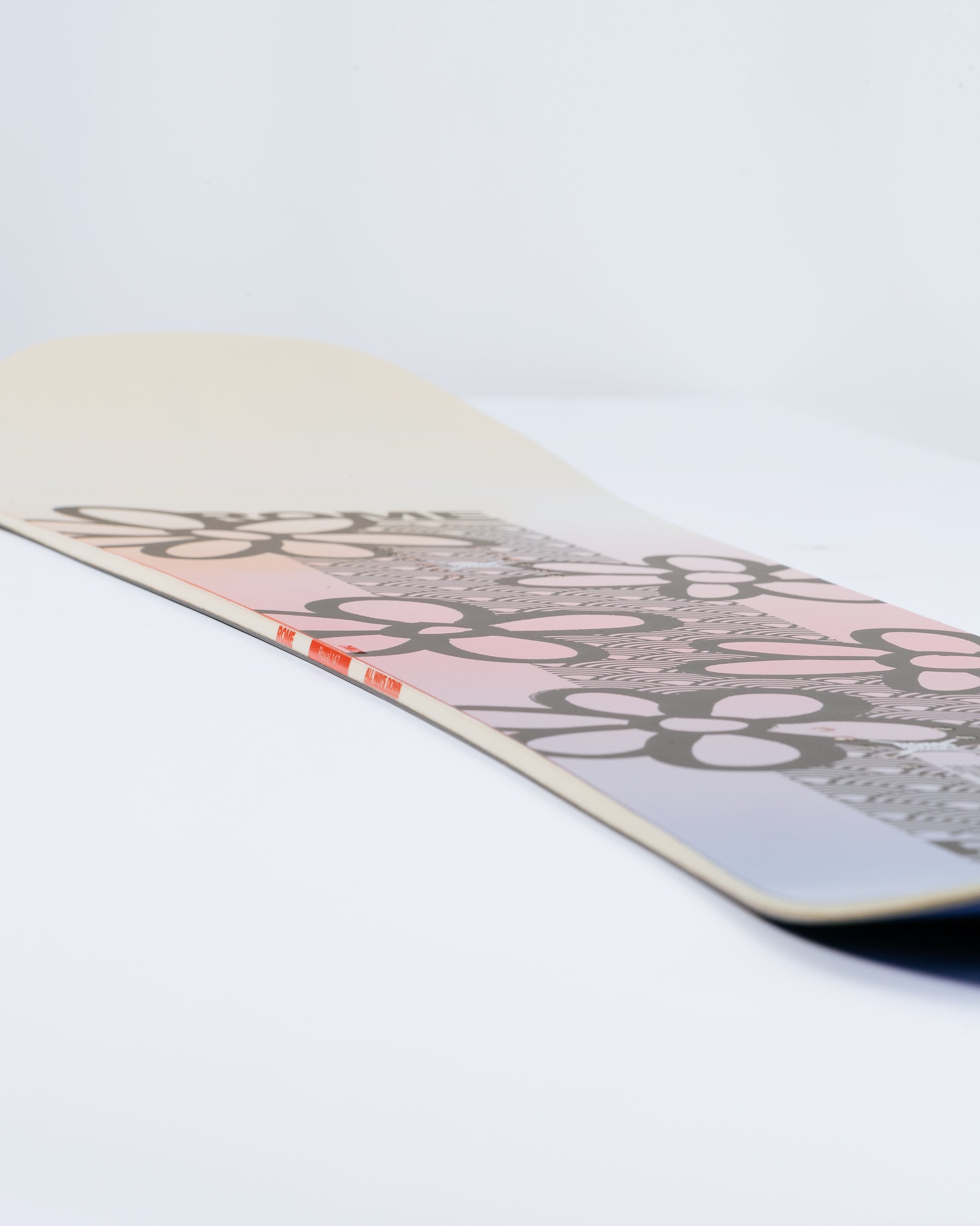 Photograph showing freeride womens snowboard with contact rocker. Royal 2025 | Rome Snowboards™ 2025.